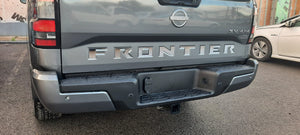 Nissan Frontier (King Cab) | 2025-2025 | Hood and Tailgate Logos | #NIFR25LOK